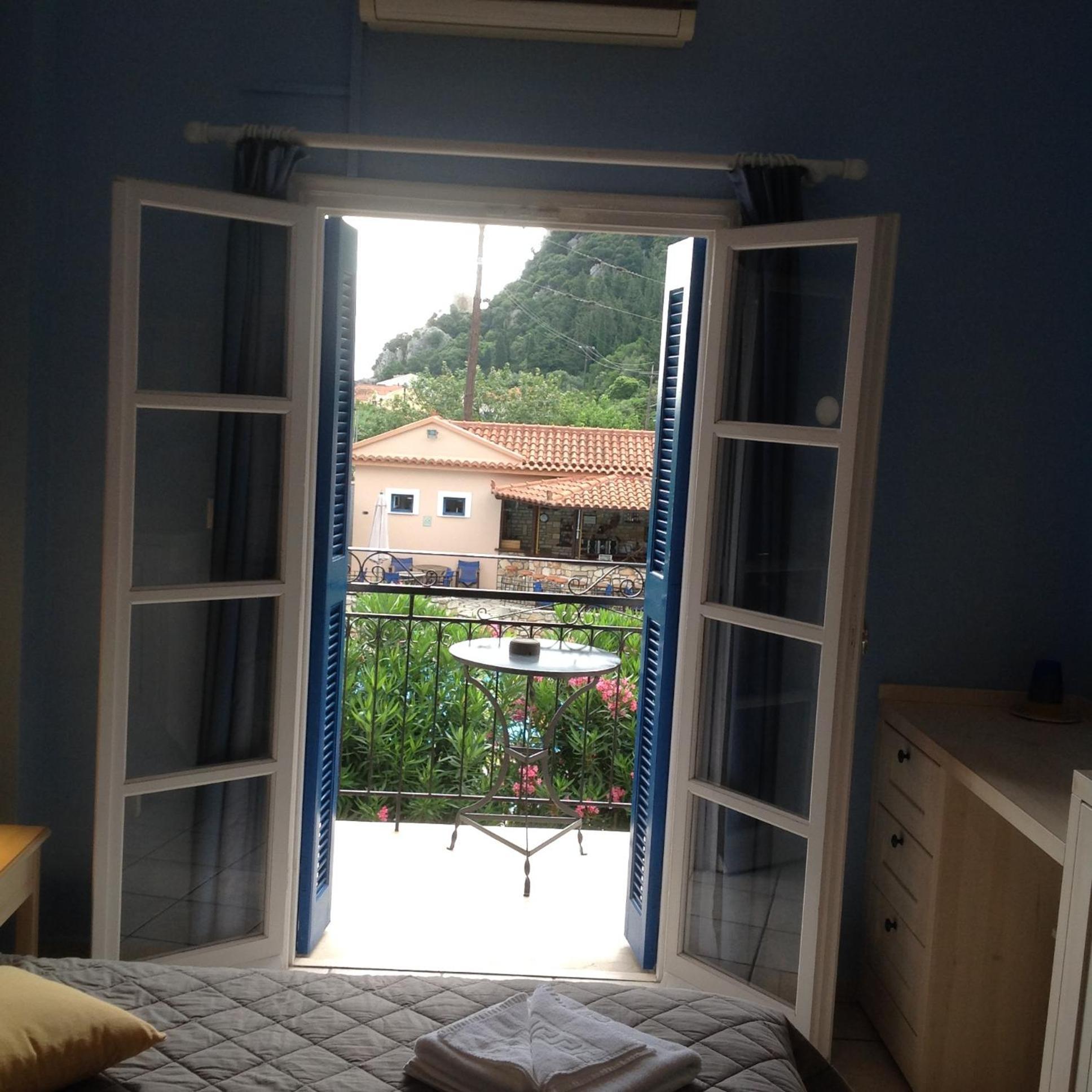 Hotel Nostos Frikes Quarto foto